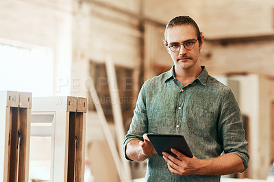 Buy stock photo Workshop, carpenter and man in portrait with tablet, research and information for wood tips. Small business, male person and builder with digital for inventory management, check and track materials