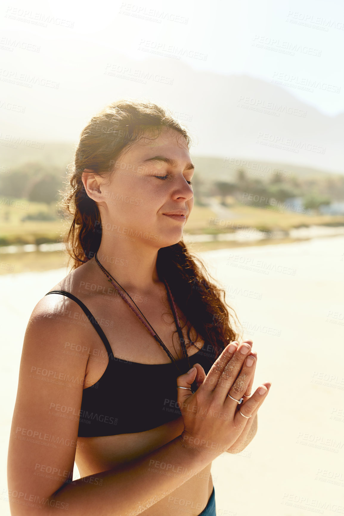 Buy stock photo Namaste, meditation and woman on beach with morning peace, health or wellness for holistic care. Zen, relax and girl at ocean for mindfulness, calm practice and yoga in nature for spiritual wellbeing