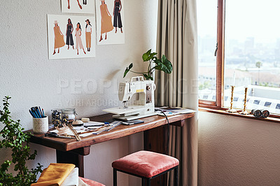 Buy stock photo Shot of a fashion designer's workstation in a workshop