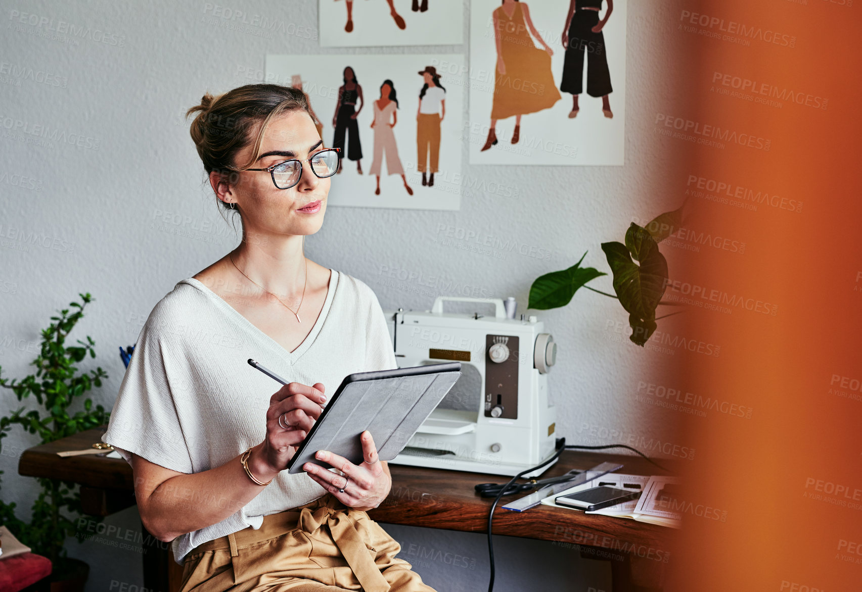 Buy stock photo Fashion, design and woman with tablet, thinking and creative ideas for small business process in studio. Creativity, textile and designer working on digital sketch with idea pattern and illustration.