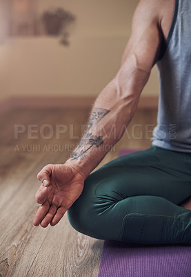 Buy stock photo Hand, yoga and person on floor, meditation and gyan mudra with breathing, mindfulness and self care at gym. Man, zen and peace with spiritual balance, holistic healing and mat in wellness studio