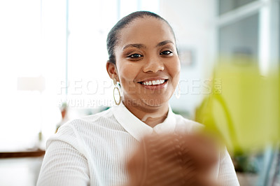 Buy stock photo Shot of a young businesswoman having a brainstorming session in a modern office