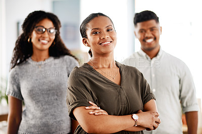 Buy stock photo Portrait of a team of young businesspeople working together in a modern office