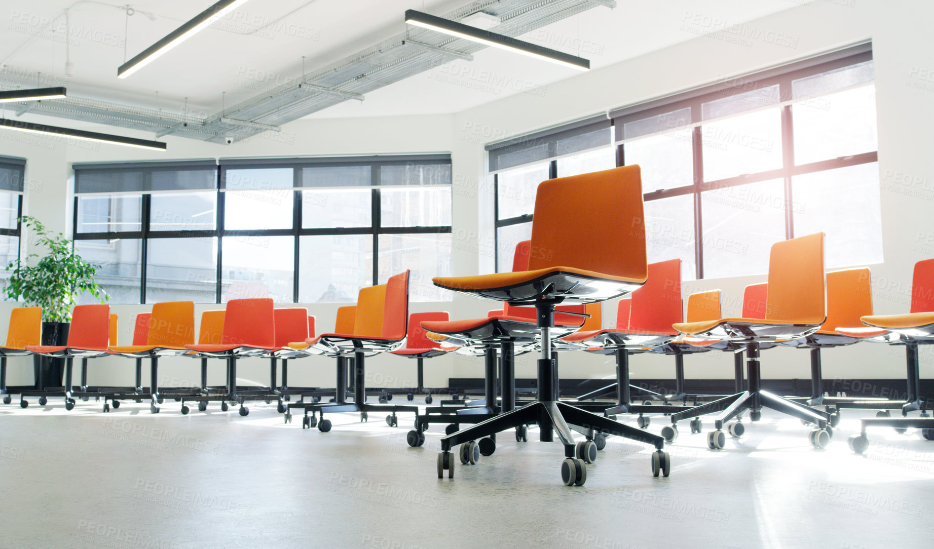 Buy stock photo Shot of chairs in an an empty modern office