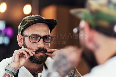 Buy stock photo Moustache, barber and man in mirror for hair grooming, wellness and hygiene for beard service. Reflection, barbershop and person in hairdresser, salon and parlor for haircare, wellness and beauty