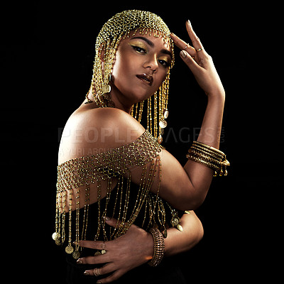 Buy stock photo African woman, portrait and gold fashion with beauty and cosmetics in a studio. Isolated, black background and young female face with crown, Egypt jewelry and culture empowerment with queen pride