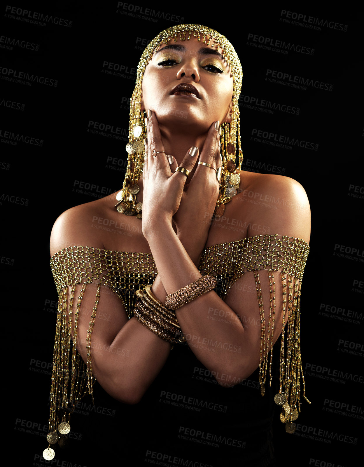 Buy stock photo African woman, portrait and gold style with beauty and cosmetics in a studio. Isolated, black background and young female face with crown, Egypt fashion and queen empowerment with luxury and makeup
