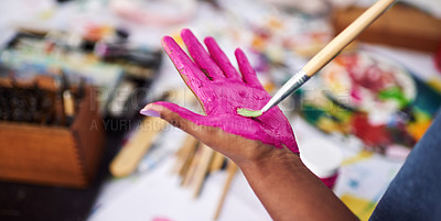 Buy stock photo Cropped shot of an unrecognizable woman painting her hand pink