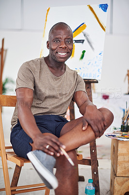 Buy stock photo Cropped shot of a middle aged man smiling at the camera in a art studio