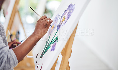 Buy stock photo Cropped shot of an unrecognizable woman working on a painting in a art studio
