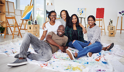 Buy stock photo Shot of a group of artists sitting together in a art studio