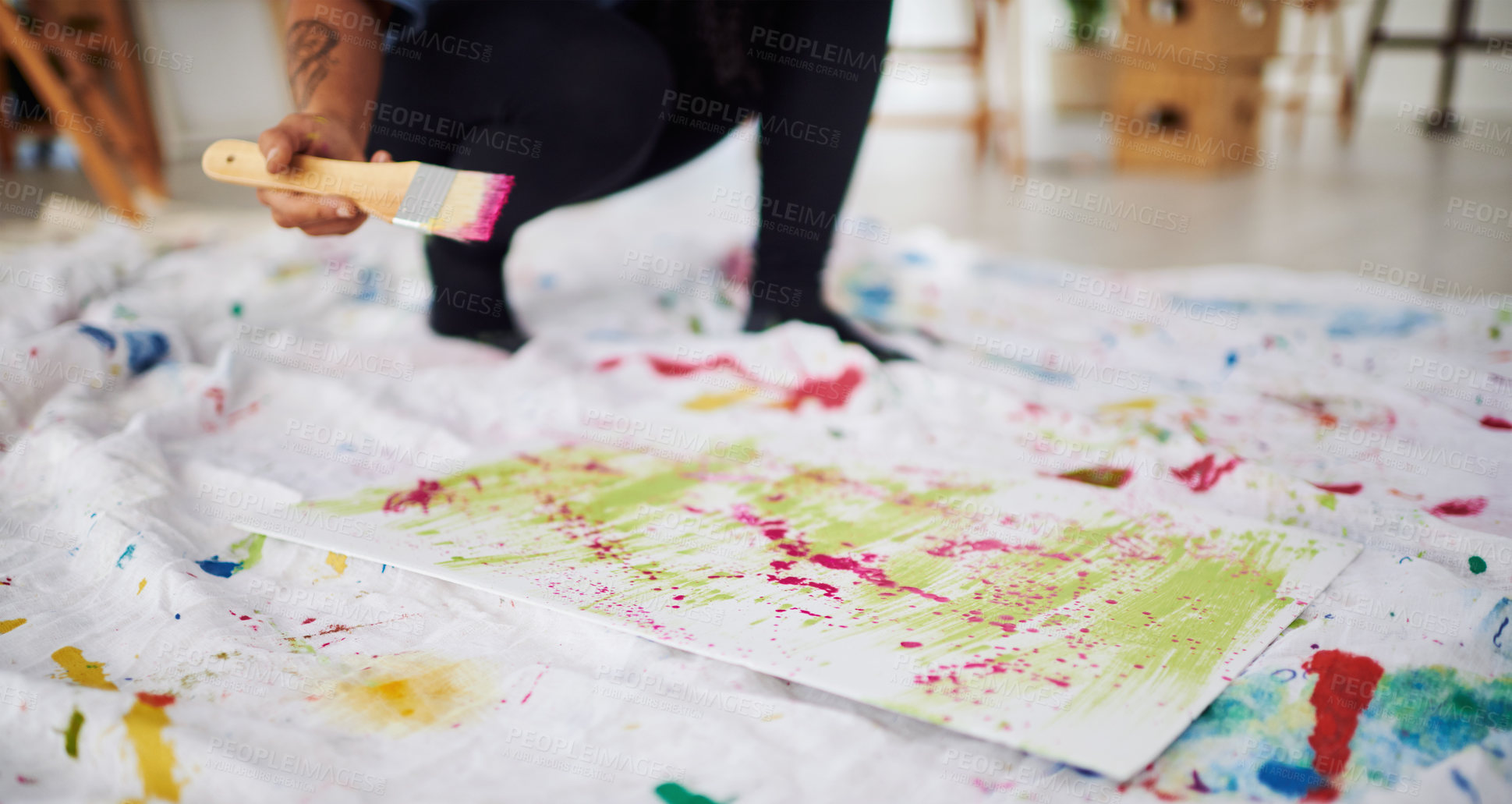 Buy stock photo Cropped shot of an unrecognizable woman painting in a art studio