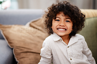 Buy stock photo Portrait of an adorable little boy relaxing and enjoying himself at home