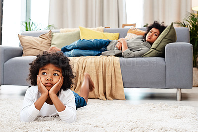 Buy stock photo Shot of two adorable little boys watching tv together at home