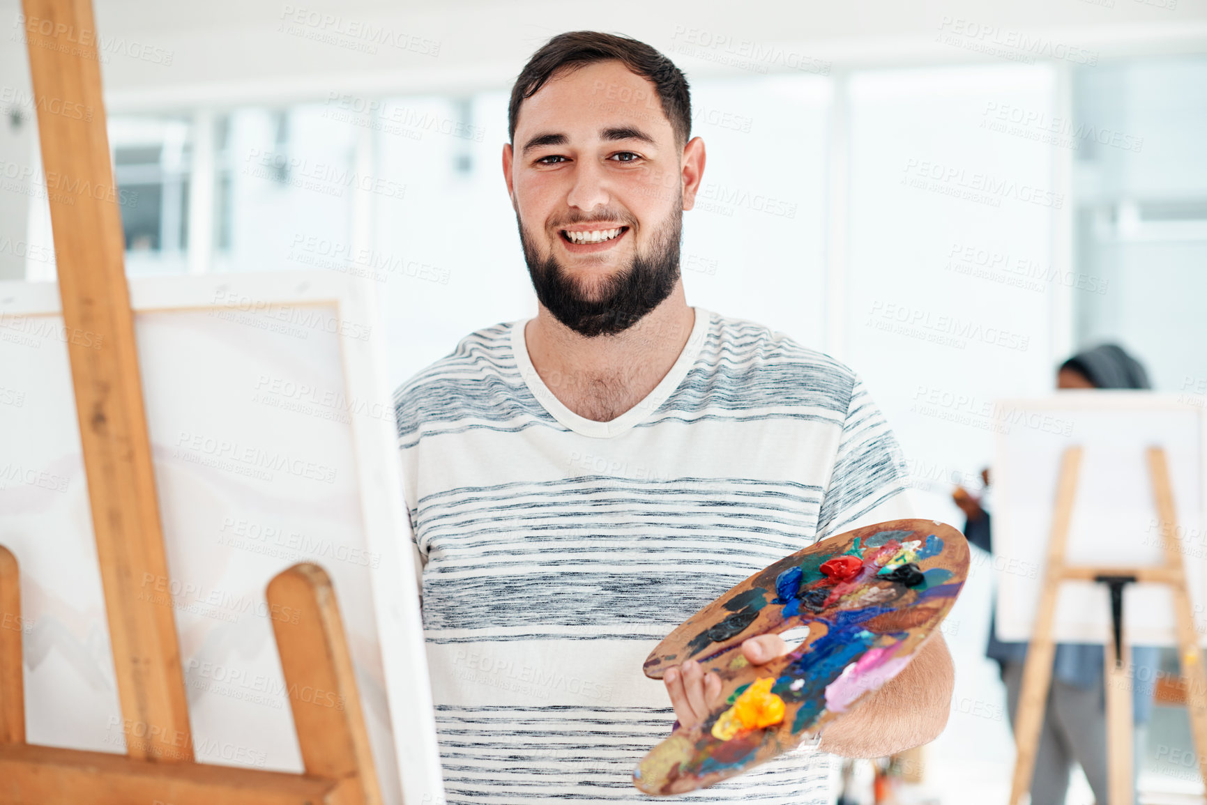 Buy stock photo Portrait, man and painting in art class with canvas for university project, inspiration or education. Workshop. easel and student artist with palette for relax, watercolor or creativity in studio