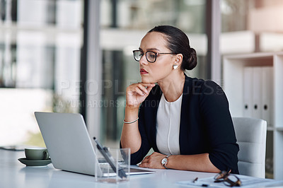 Buy stock photo Office, businesswoman and online with laptop for reading, information and digital for report. Career, female person and journalist with thinking for finance publication, news story and article ideas