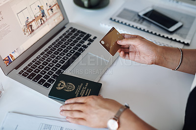 Buy stock photo Cropped shop of an unrecognizable businesswoman using a credit card and laptop inside her laptop