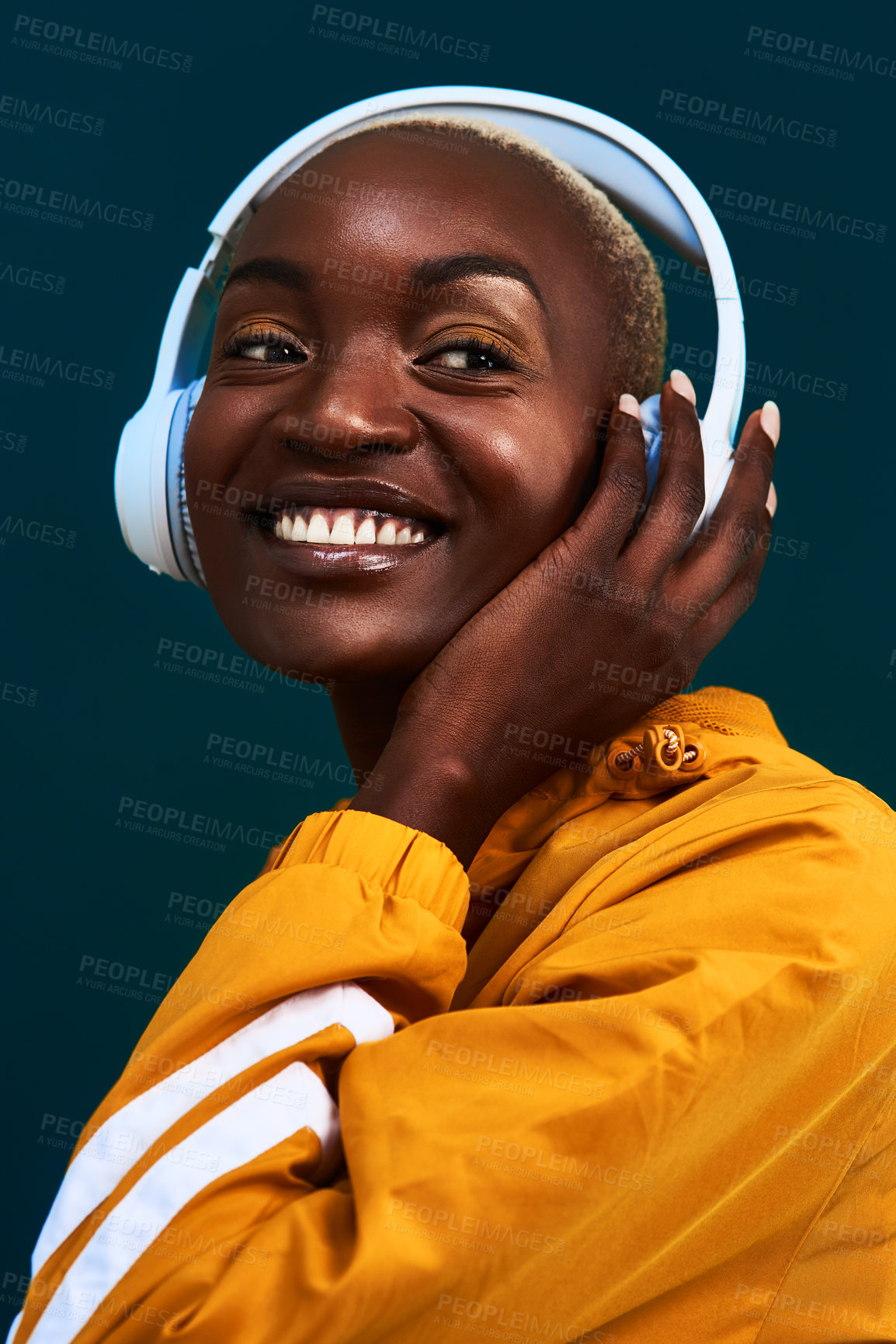 Buy stock photo Black woman, headphones and thinking with exercise, workout and fitness playlist in studio. Streaming, radio and happy from athlete training and idea with internet music and joy with dark background