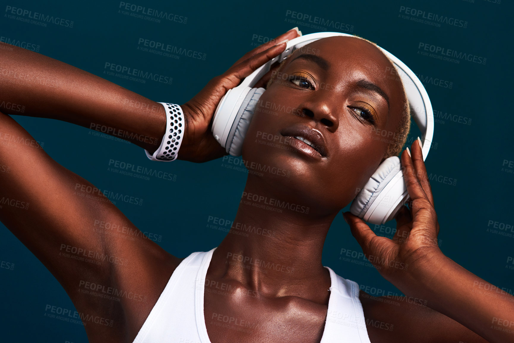 Buy stock photo Black woman, headphones and relax with exercise music, workout and fitness playlist in studio. Streaming, radio and song with athlete training and wellness with internet audio with dark background