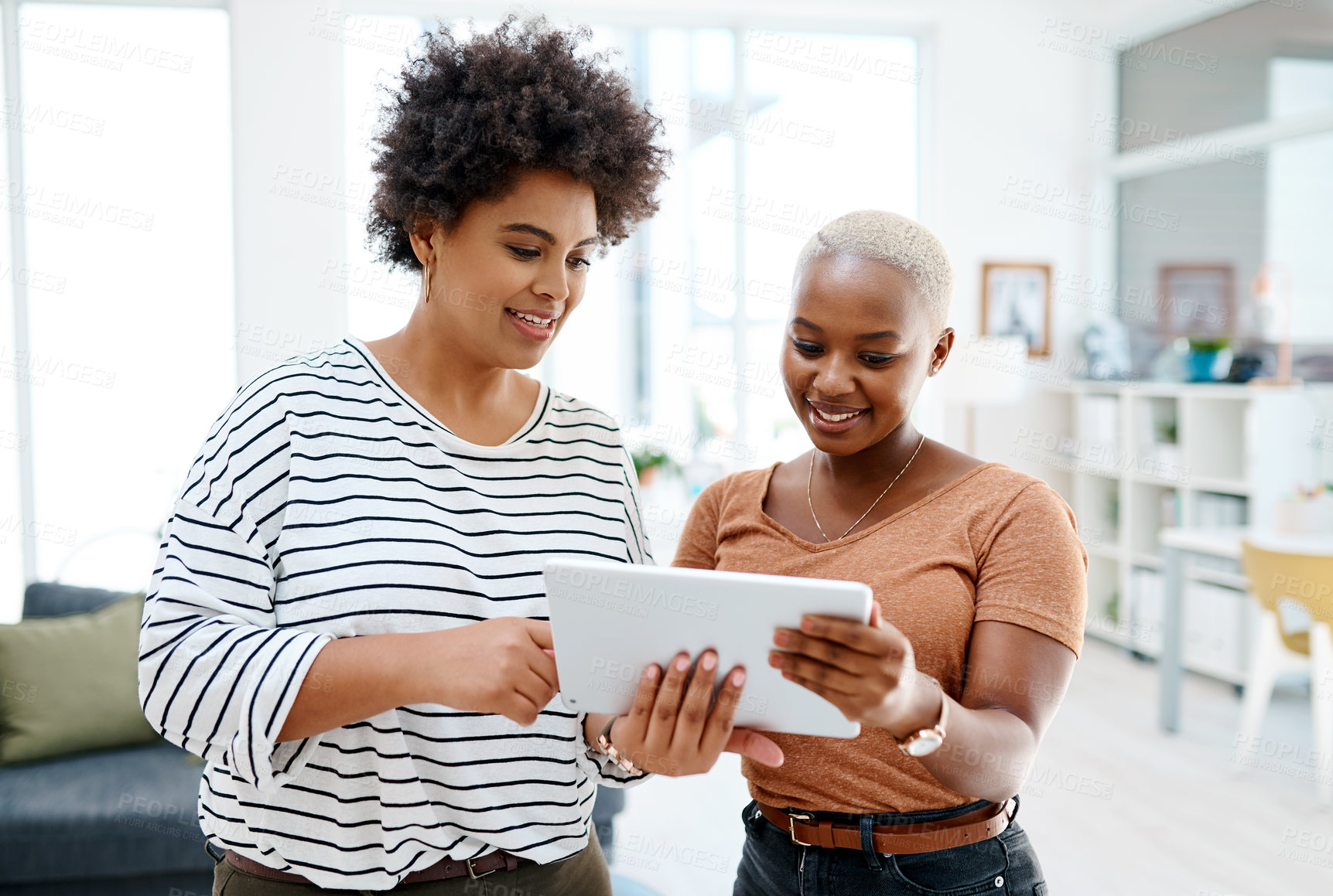 Buy stock photo Office, business people and discussion with tablet for reading, research and copywriting as journalists. Workplace, technology and digital with writers for brainstorming, article ideas and planning