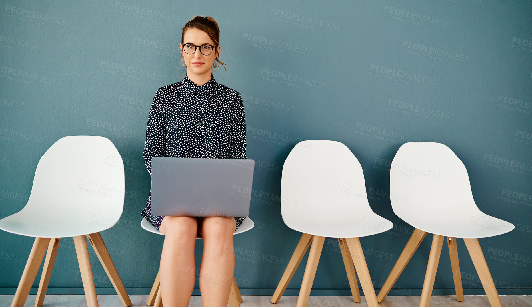 Buy stock photo Portrait, laptop and woman in waiting room for interview, job application or recruitment on chair. Hiring, typing and female person with technology in office for opportunity, onboarding or employment