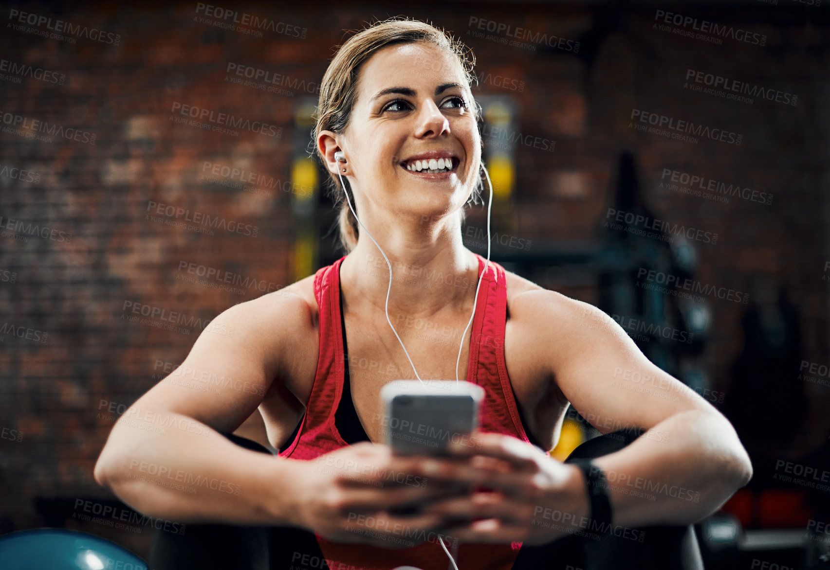 Buy stock photo Gym, girl and music with smartphone for workout, training and exercising with technology. Fitness club, female person and headset for listening to radio, podcast or scroll on mobile app for playlist