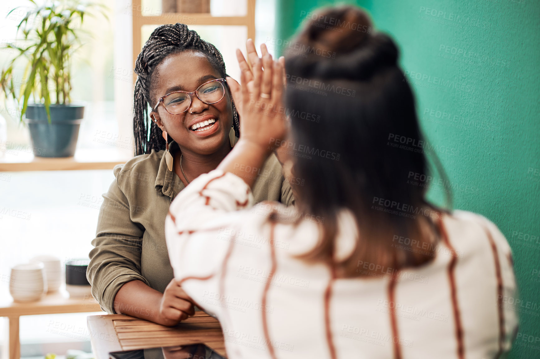 Buy stock photo Happy, friends and women in a cafe, high five and bonding with agreement, happiness and joyful. Female people, girls and students with support, coffee shop and excited with a smile, goal and target