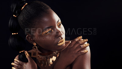 Buy stock photo Beauty, glitter and black woman in studio for makeup, art and confidence on black background. Face, creative and African female model pose with jewelry for wealth, royal and luxury gold aesthetic