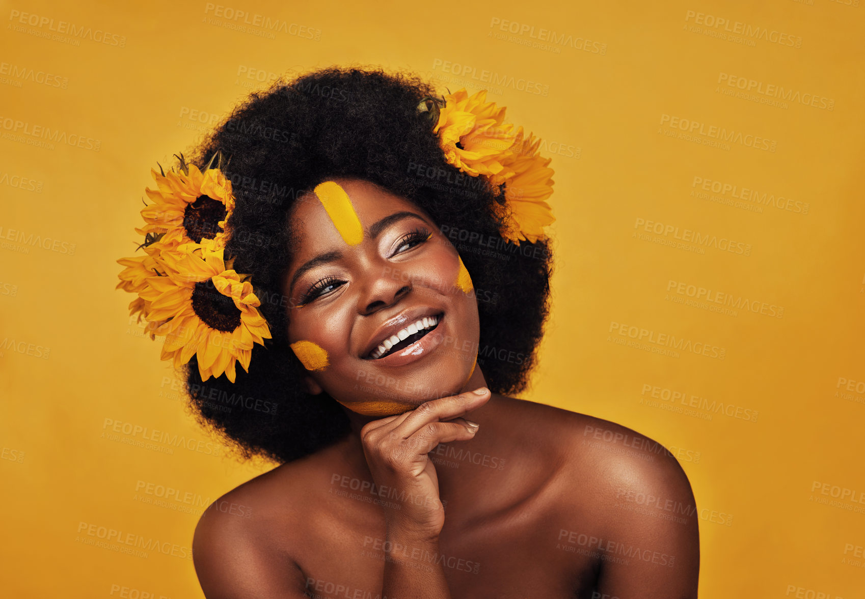 Buy stock photo Black woman, studio and natural hair and sunflowers, nature skincare and rest with African model and afro. Selfcare, wellness for beauty with organic cosmetics, dermatology on yellow background