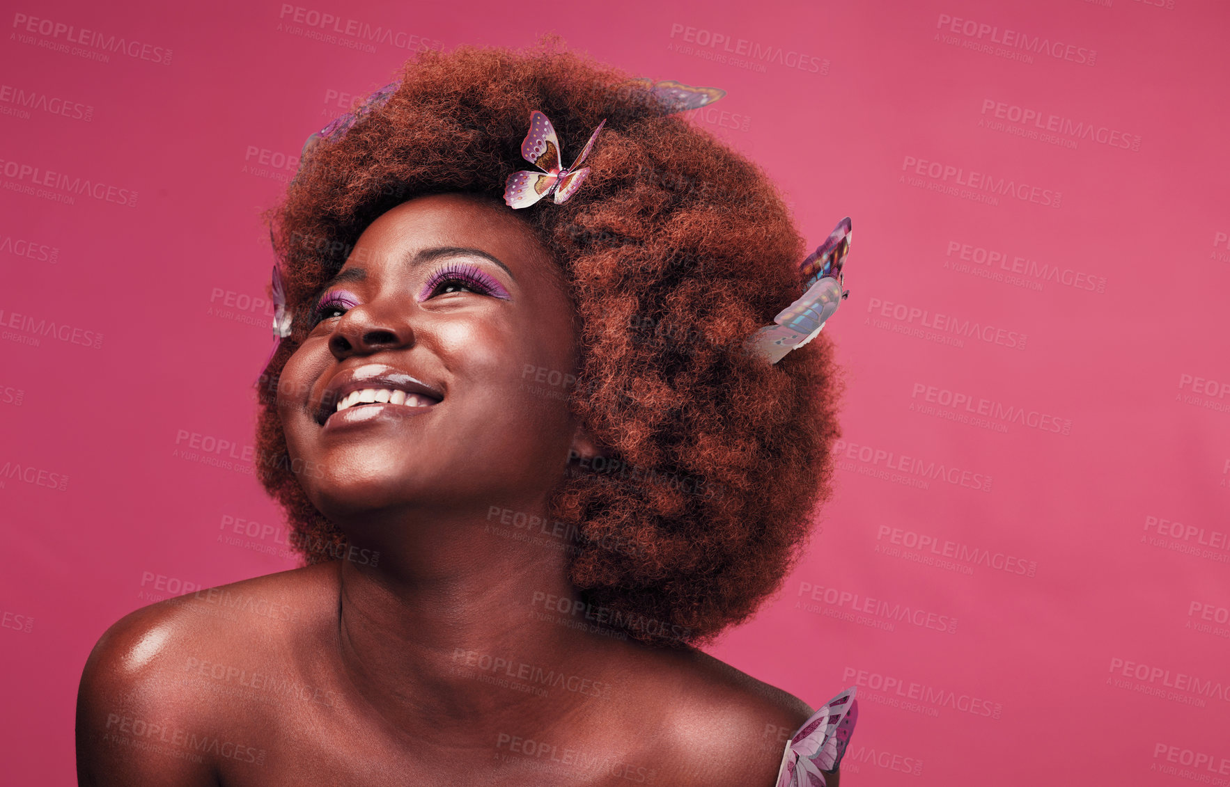 Buy stock photo Beauty, smile and black woman with butterflies in studio with creative, art and fantasy. Cosmetics, happy and female model from Nigeria with insects for facial cosmetology by pink background.