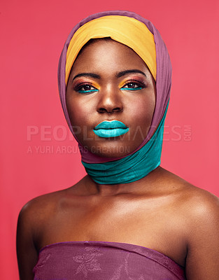 Buy stock photo Bold makeup, headwrap and portrait of a black woman isolated on a pink background in a studio. Bright, color and headshot of an African model with headwear and cosmetics for culture and lifestyle