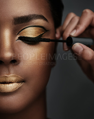 Buy stock photo Cropped shot of a beautiful young woman having her makeup done