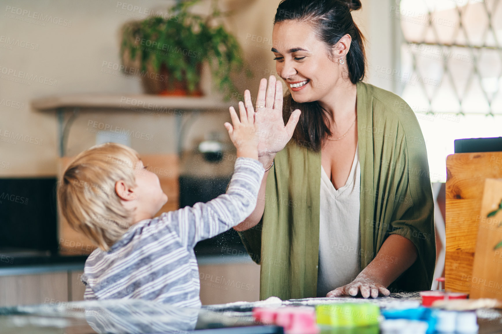 Buy stock photo Baking, high five and mother in kitchen with kid for bonding, weekend and help in home. Learning, achievement and happy woman with boy at counter for growth, child development and cookie ingredients