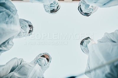 Buy stock photo Covid pandemic outbreak team of doctors or medical workers wearing protective ppe to prevent spread of virus in hospital. Group of scientists wearing hazmat suits for corona or ebola disease in lab.
