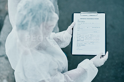 Buy stock photo Shot of a healthcare worker wearing a hazmat suit working to control an outbreak