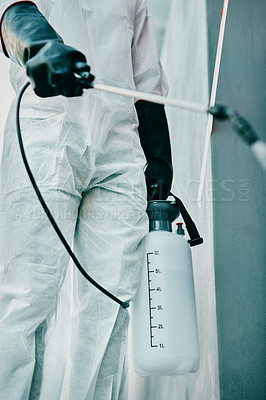Buy stock photo Covid pandemic outbreak cleaner and healthcare worker in protective ppe to prevent spread of virus outside. Professional in hazmat suit cleaning and disinfecting the street or building for hygiene