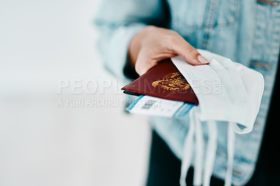 Buy stock photo Covid, person and hands with passport, face mask and protection for boarding pass at airport. Closeup, travel and tourists journey of passenger with personal visa for safety, security or safeguarding