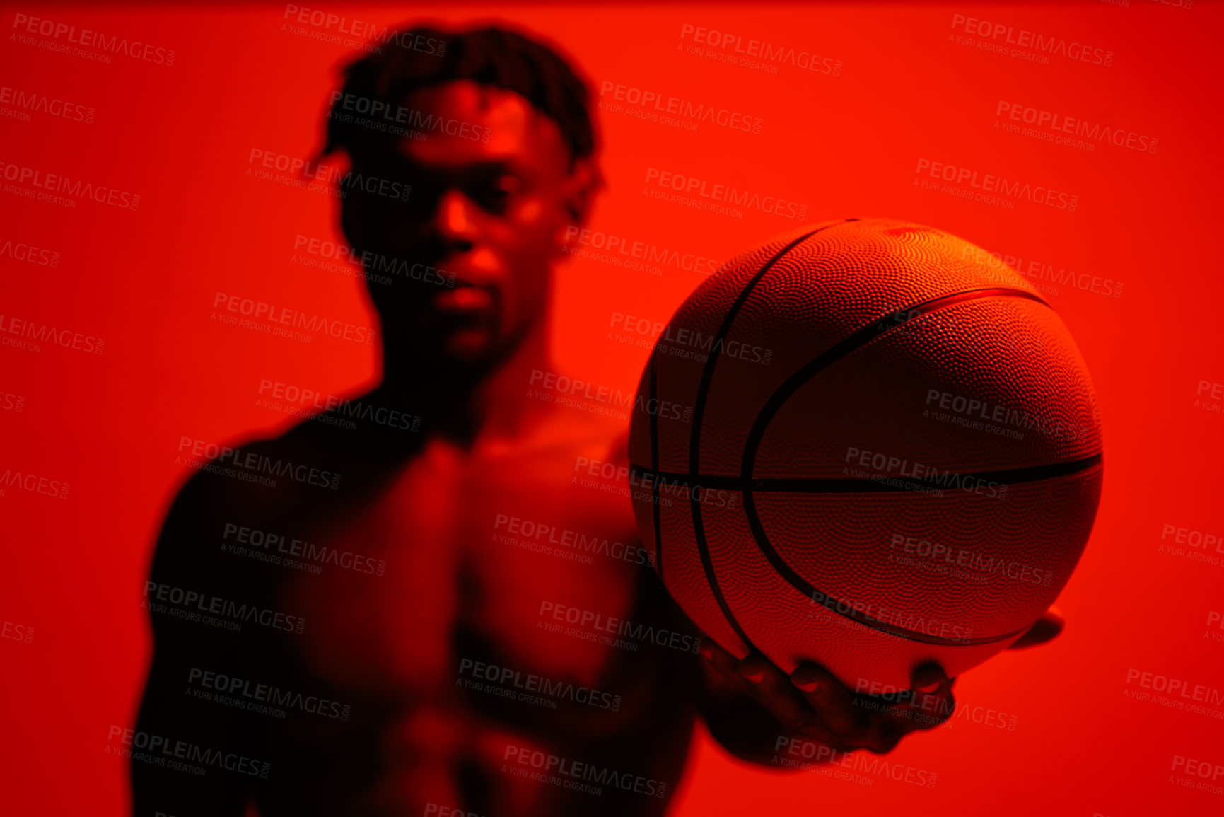 Buy stock photo Basketball, fitness and and training with man in red filter lighting for challenge, game or performance. Exercise, health and sports with African person in studio for competition or recreation