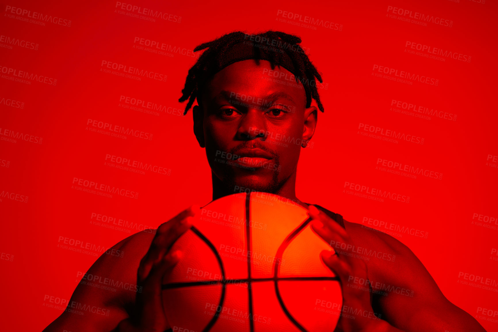 Buy stock photo Basketball, exercise and portrait with man in red neon lighting for challenge, game or performance. Fitness, health and sports with face of African person in studio for competition or recreation