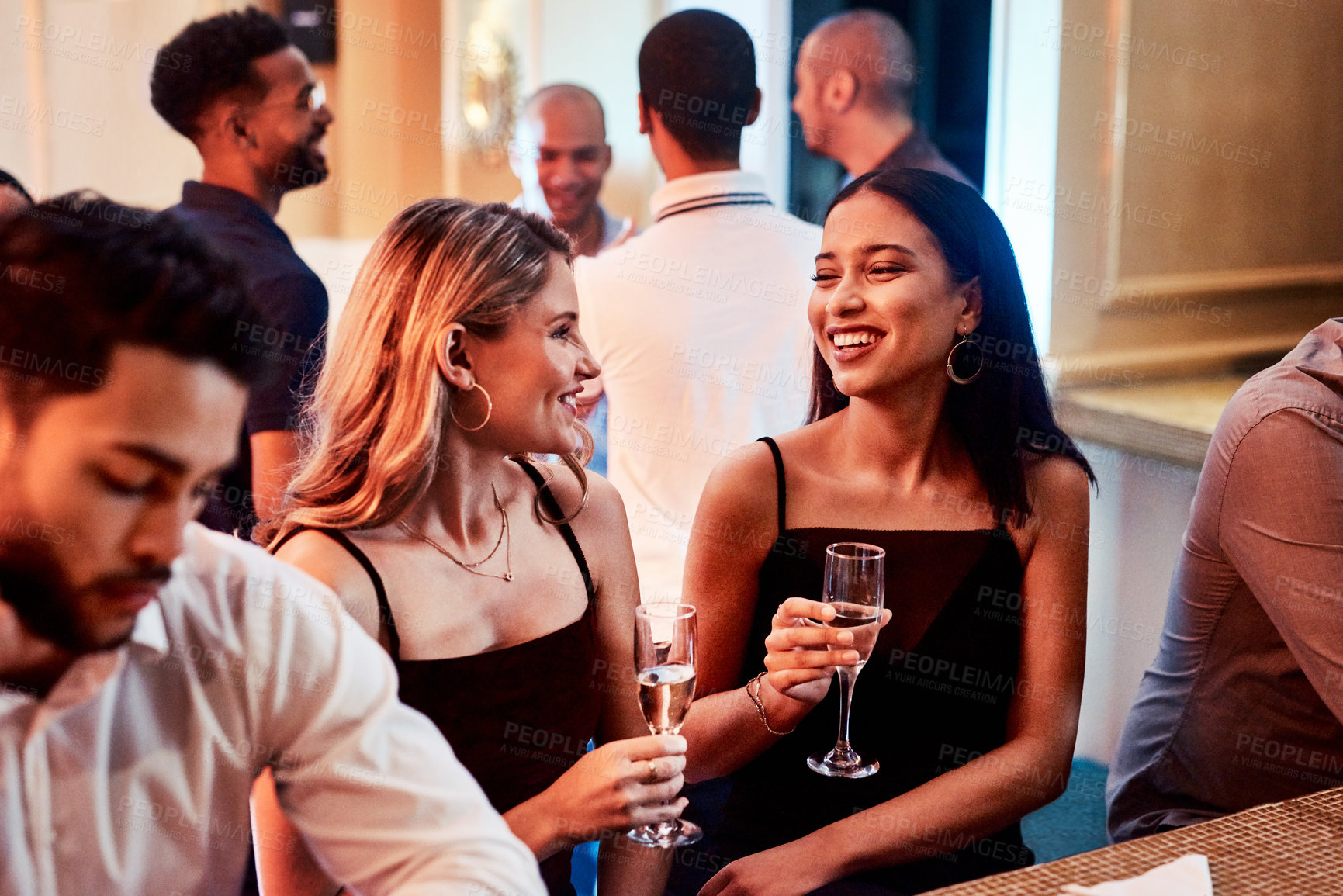 Buy stock photo Friends, party and alcohol drink, champagne and event at restaurant, happy smile and crowd conversation at night. People talking, drinking and happiness at club together talking, fun and social