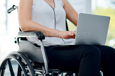Buy stock photo Cropped shot of an unrecognizable businesswoman using her laptop in the office