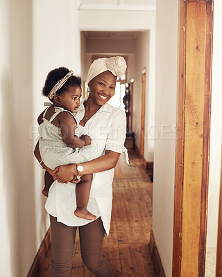 Buy stock photo Cropped shot of an adorable baby girl bonding with her mother at home