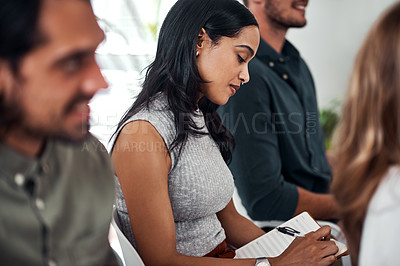 Buy stock photo Business woman, conference and writing notes with crowd for training, development and growth in career. People, workshop and audience with diversity, notebook or thinking with team at startup company