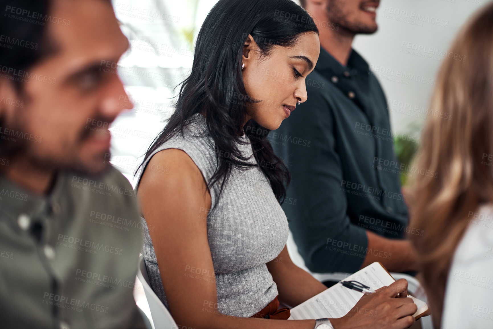 Buy stock photo Business woman, conference and writing notes with crowd for training, development and growth in career. People, workshop and audience with diversity, notebook or thinking with team at startup company