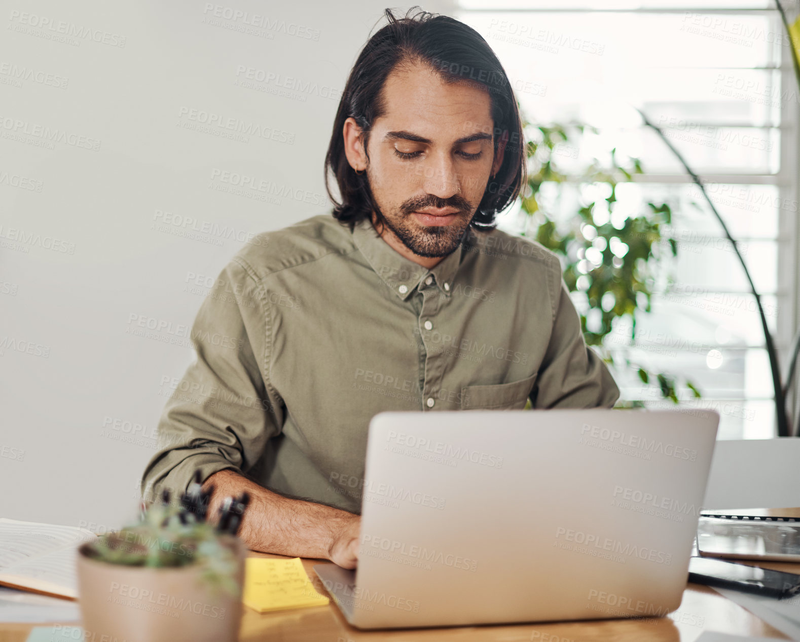 Buy stock photo Businessman, typing and laptop in modern office for research, writing email and planning schedule. Journalist, male person and computer for reading online news, website homepage and editing article