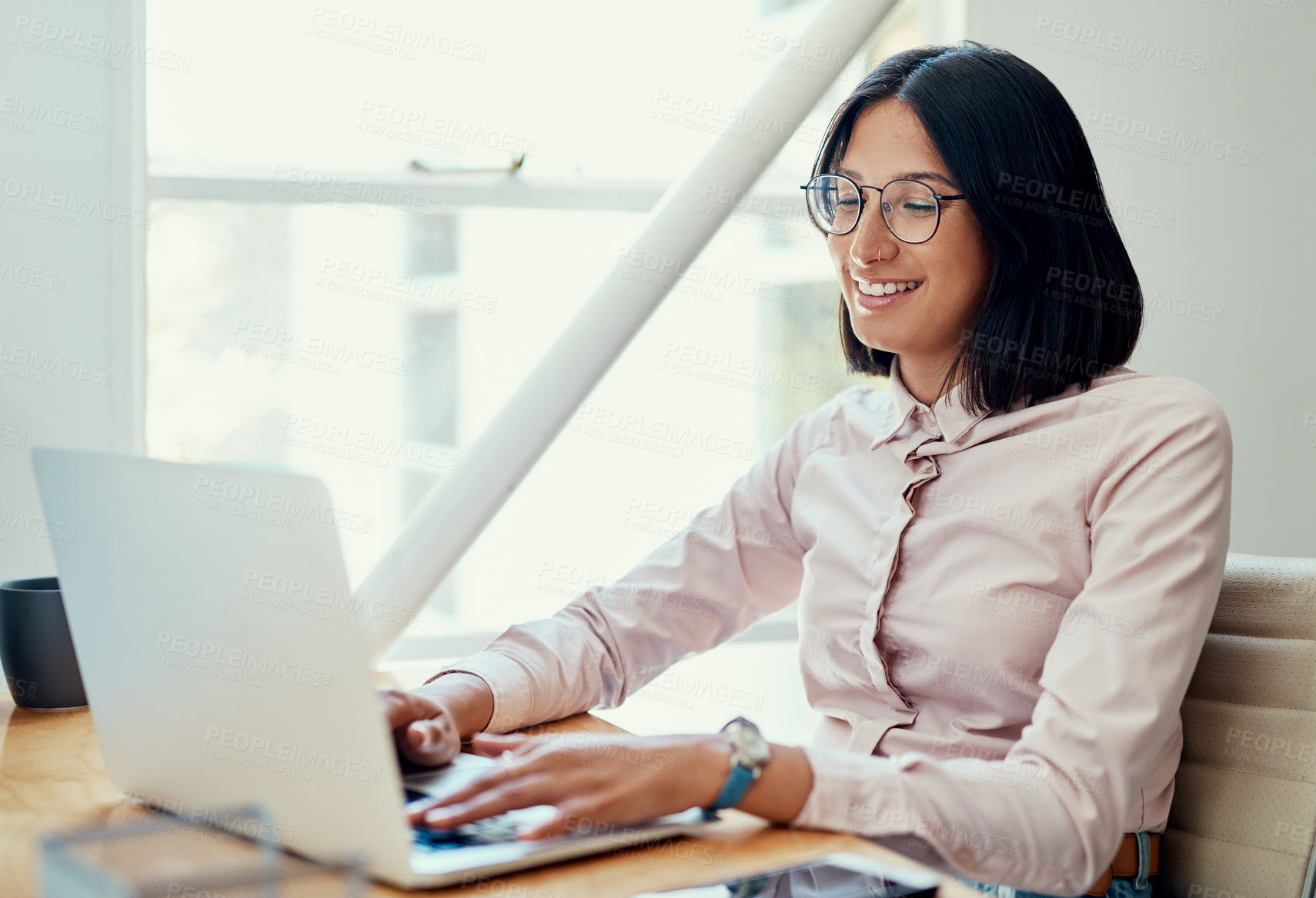 Buy stock photo Woman, happy and typing on laptop at desk for research, email or online review for website. Journalist, technology and writing article with internet for creativity, career and networking for business