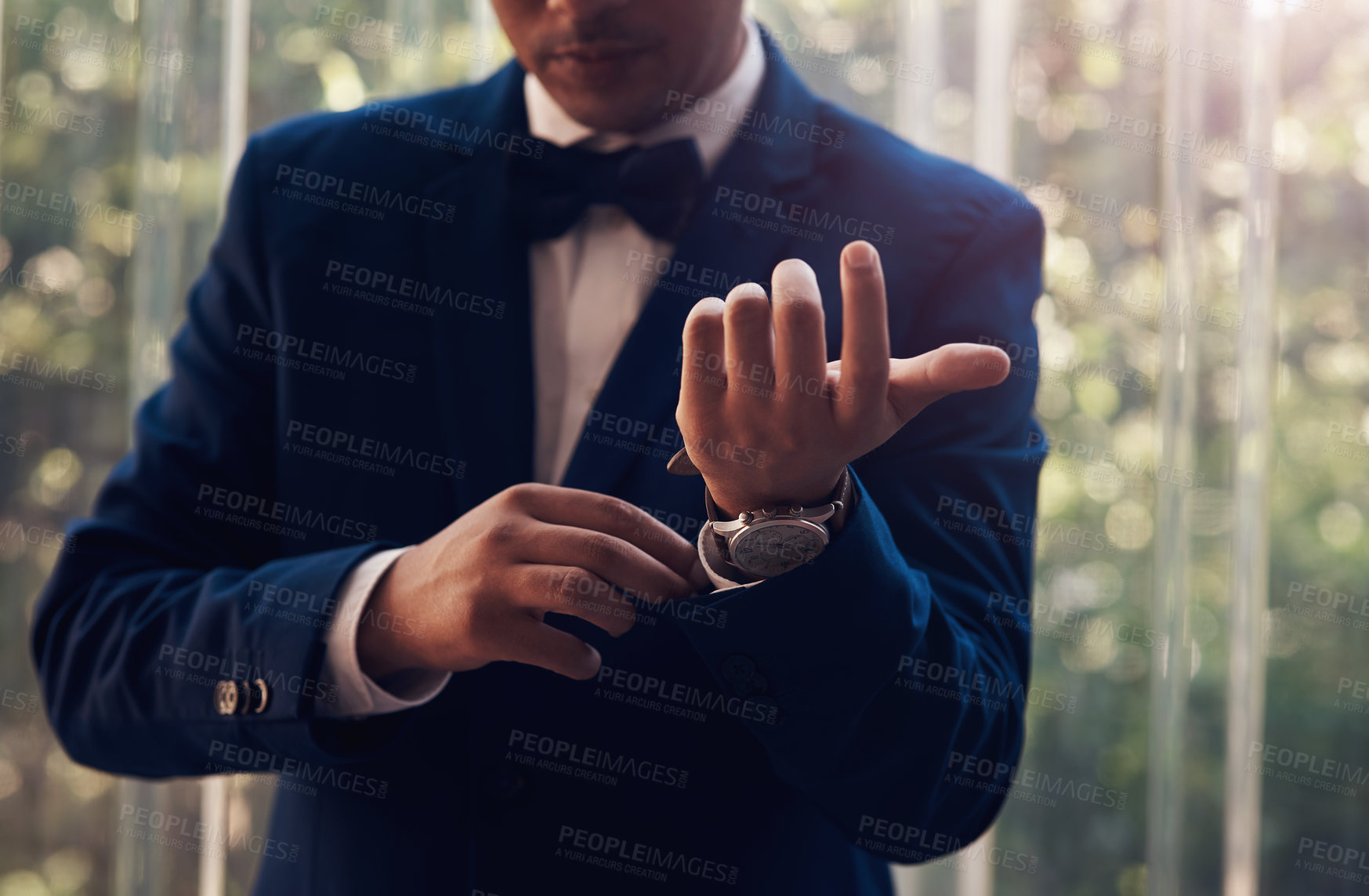 Buy stock photo Cropped shot of an unrecognizable 
 man getting dressed on his wedding day