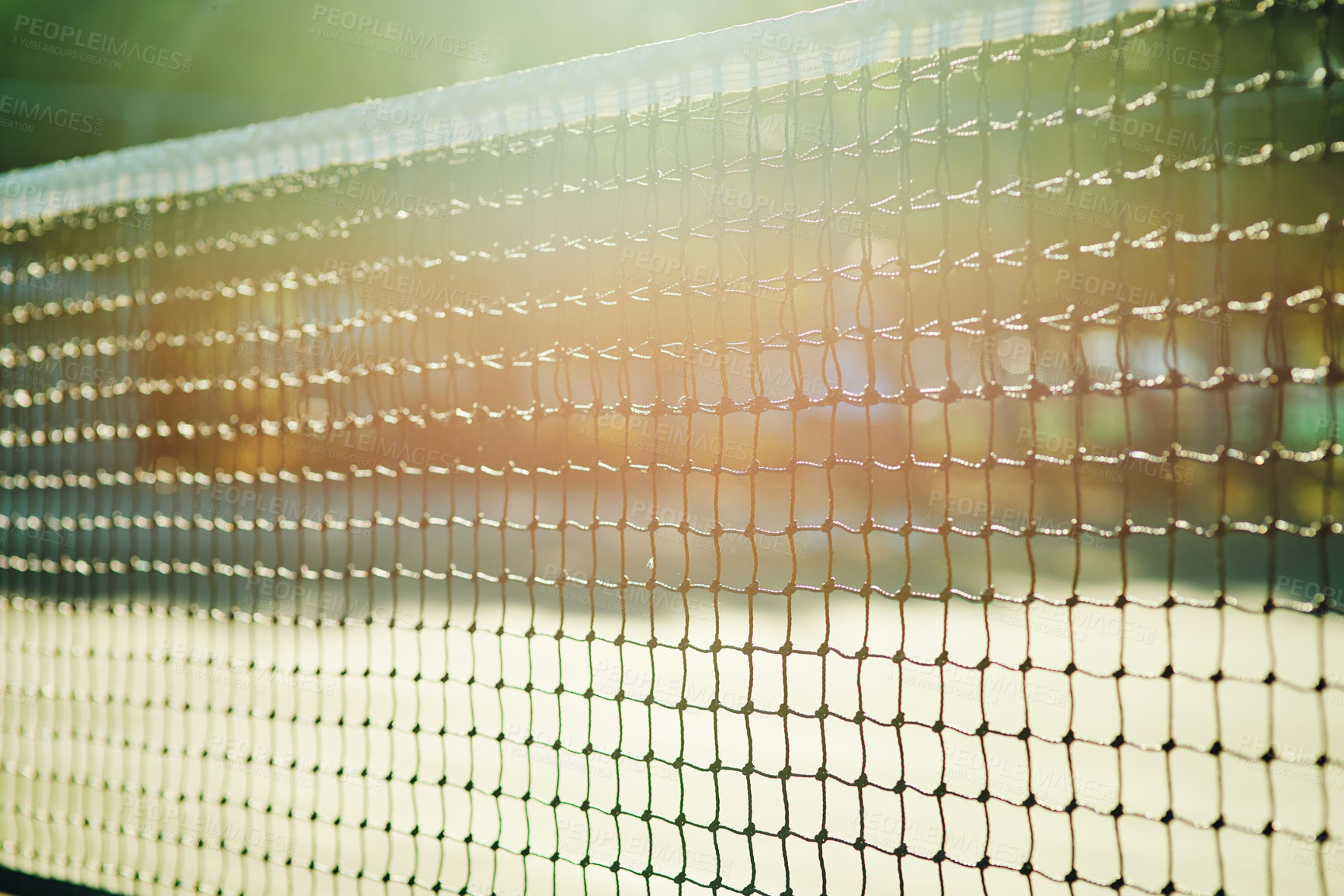 Buy stock photo Closeup shot of a tennis net on a tennis court