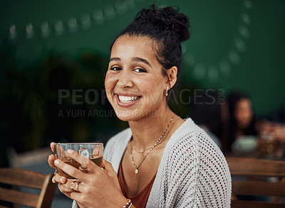 Buy stock photo Shot of a beautiful young woman enjoying a relaxing break at a cafe
