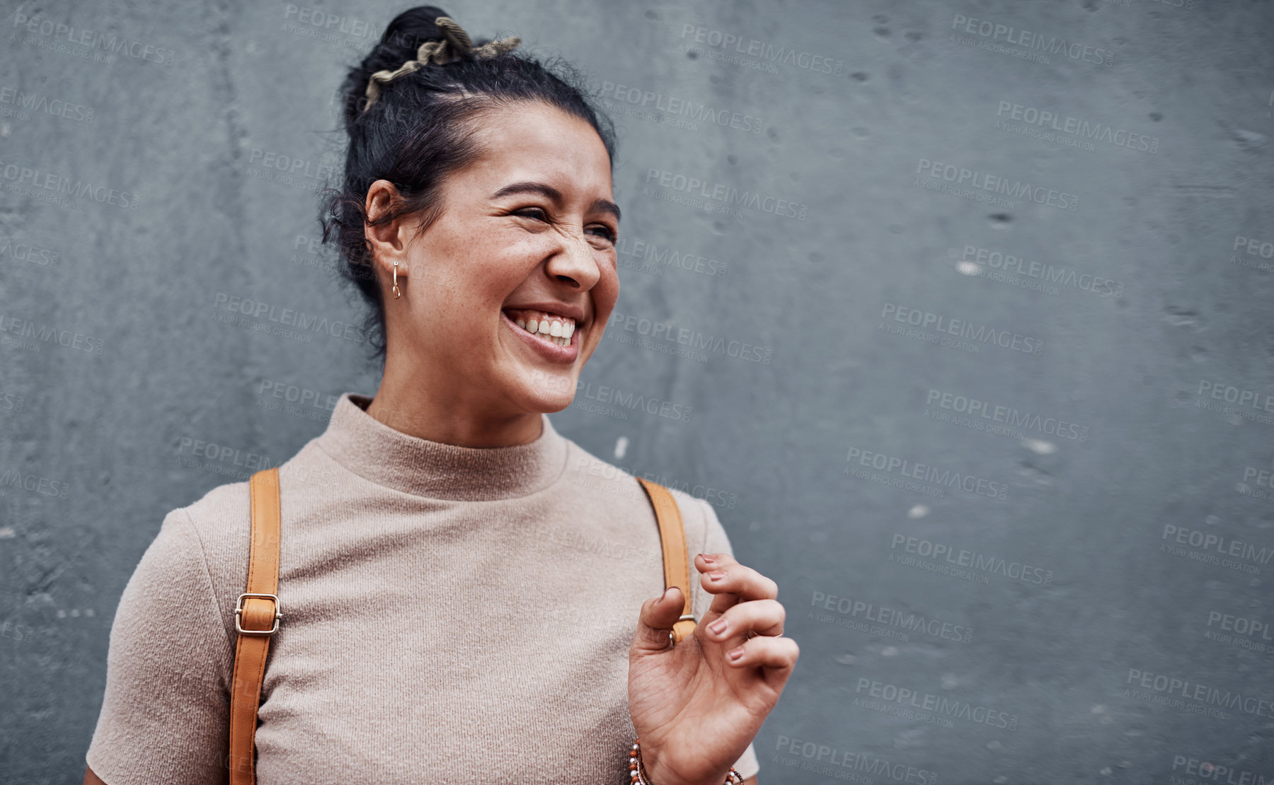 Buy stock photo Grey wall, smile and funny with girl. happiness and confidence with fashion, break and humor. Person, outdoor and woman with pride, laughing and cheerful with fun, joyful and urban town with gen z